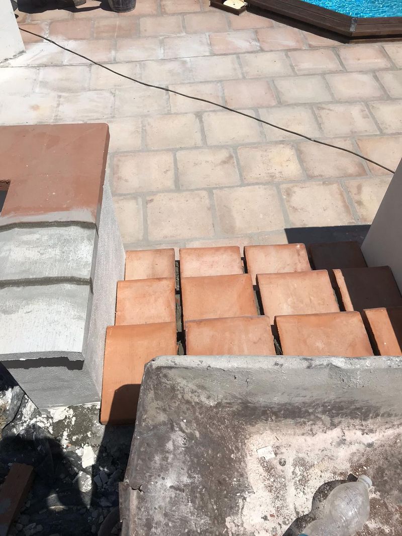colocación de losas de exterior